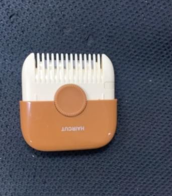 Portable Two In One Hair Clipper And Hair Comb
